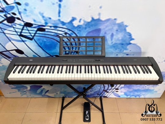 Piano Korg SP-200